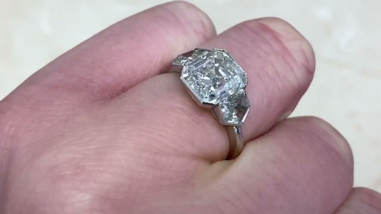 3.14ct Emerald Cut & Bullet Shape Three Stone Diamond Engagement Ring - Deansgate Ring - Hand Video
