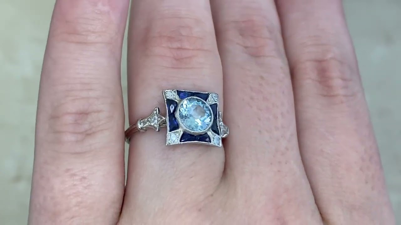 Geometric Aquamarine and Sapphire Halo Fort Collins Ring - hand video -