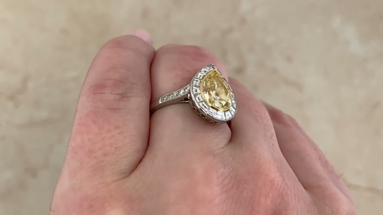 2.60 Natural Fancy Yellow Pear Shaped Diamond Tyrone Ring - hand video