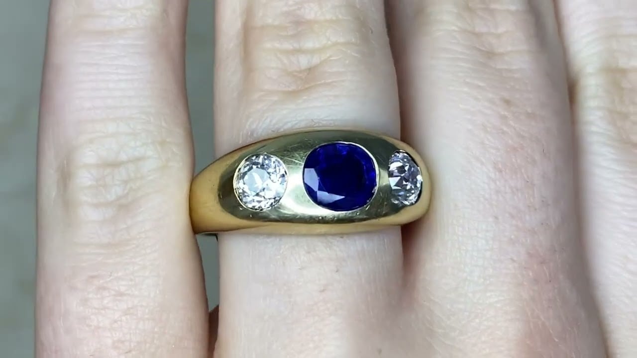 Three-stone ring featuring a 1.20ct oval cut no-heat Burma sapphire - Celano Ring-  Hand video