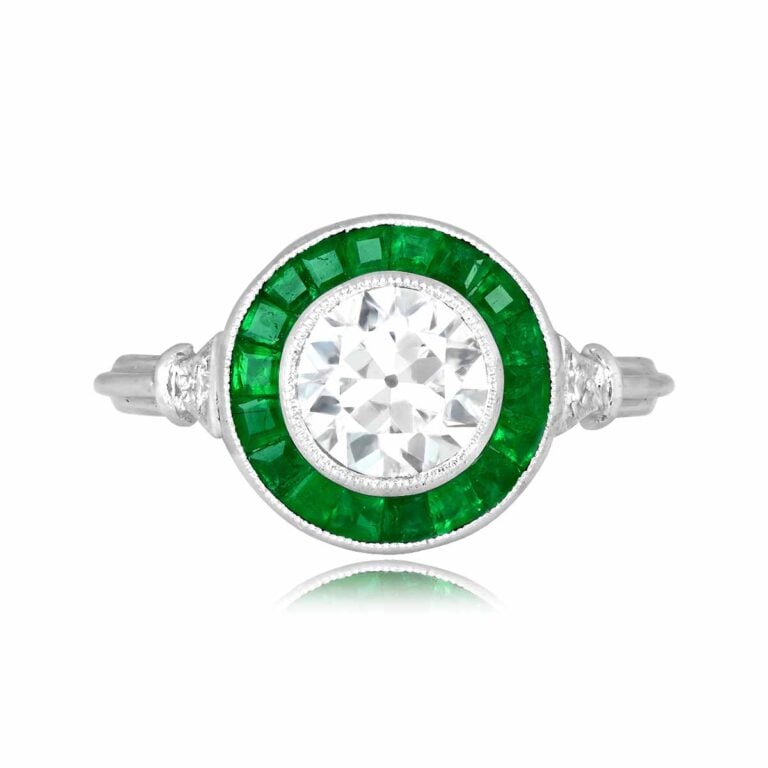 0.69ct Diamond and Emerald Halo Platinum Benton Ring