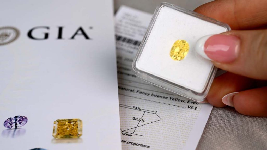 Fancy Intense Yellow Diamond Oval Cut in Box with GIA Certification