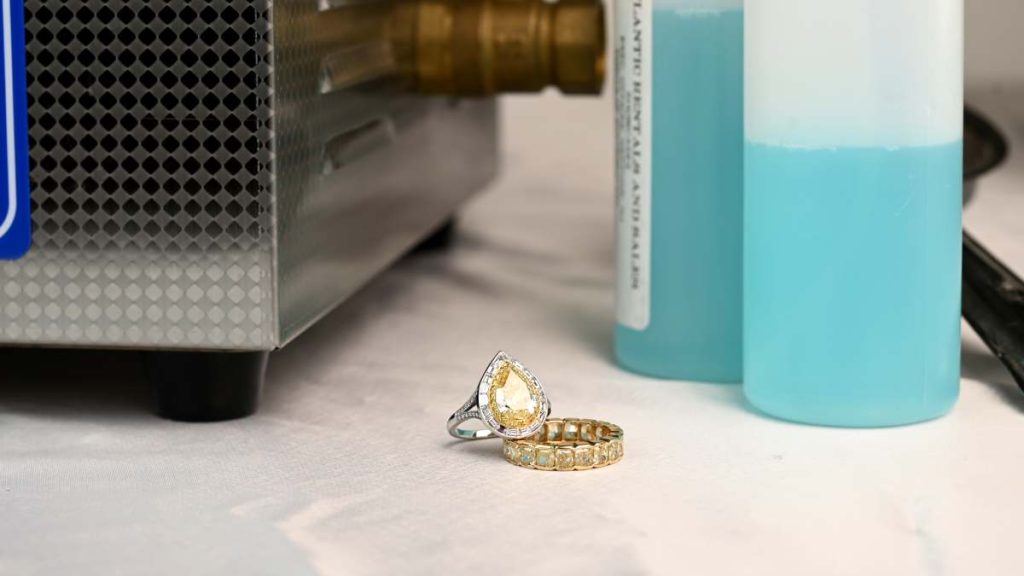 Yellow Diamond Ring and Band near chemicals and machinery