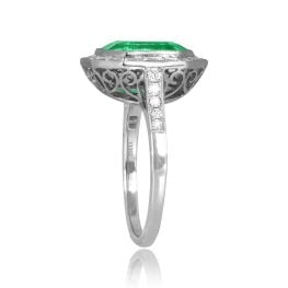 GIA certified 4.55ct Colombian Emerald with diamond halo Thornhill Ring