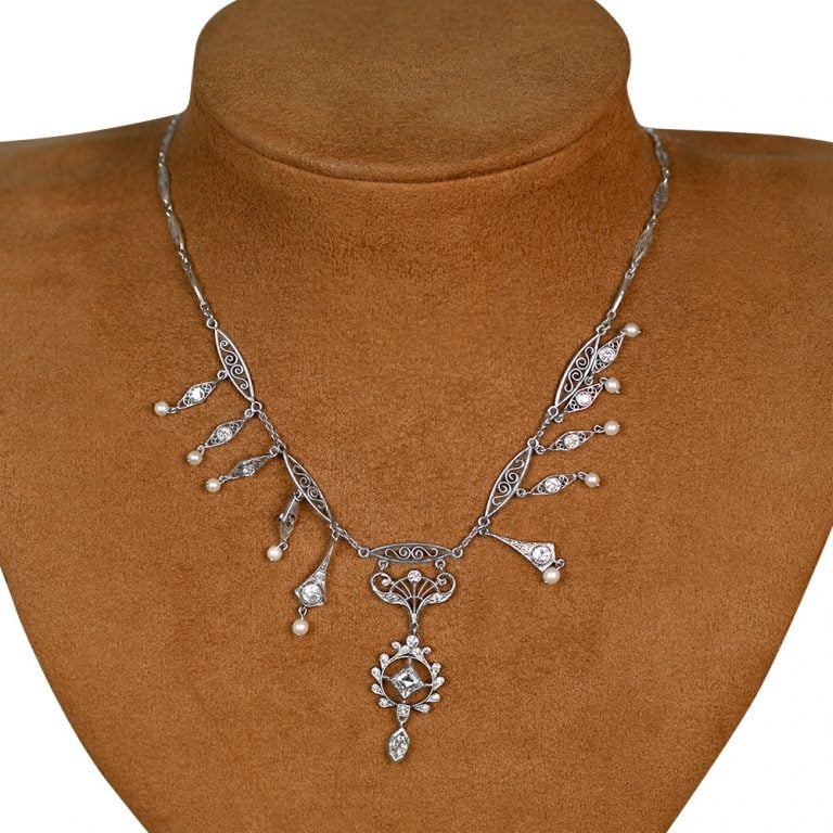 Edwardian Era Diamond and Pearl Tilton Necklace. Antique, Circa 1900.