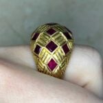Schlumberger vintage dome ring with checker pattern made out of rubies and etched gold boxes