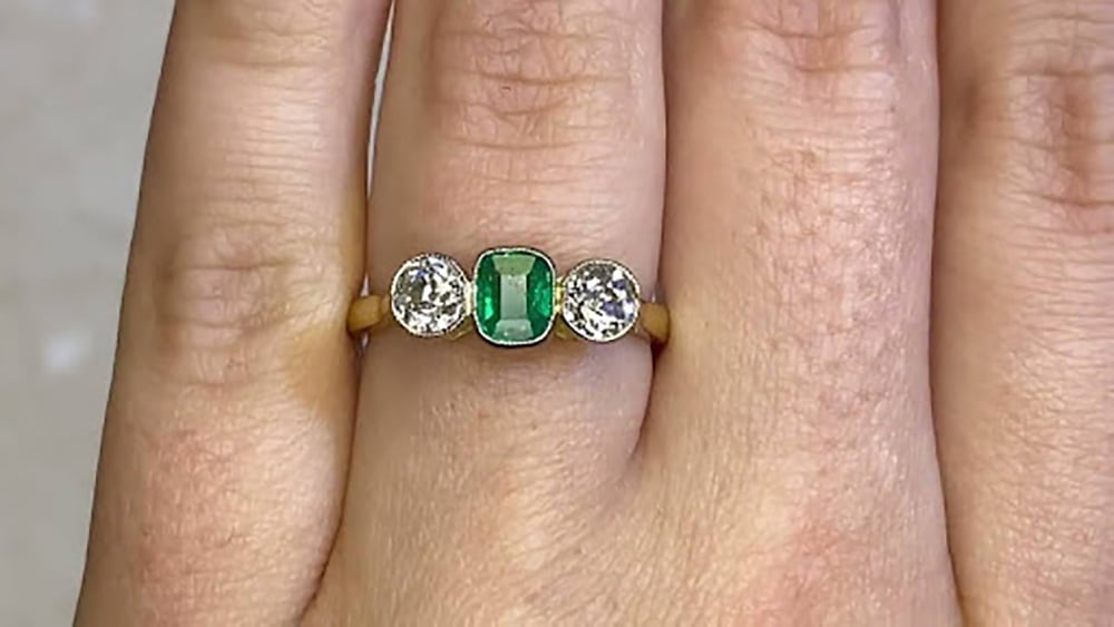 emerald and diamond ring in gold and platinum