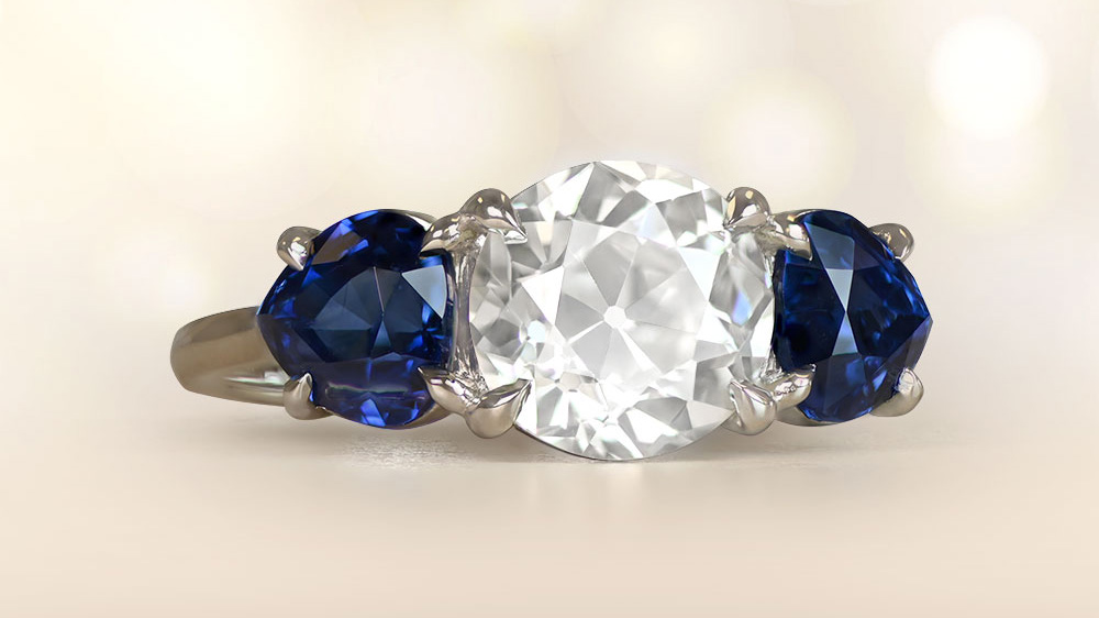 Platinum Three Stone Bezel Set Diamond Engagement Ring
