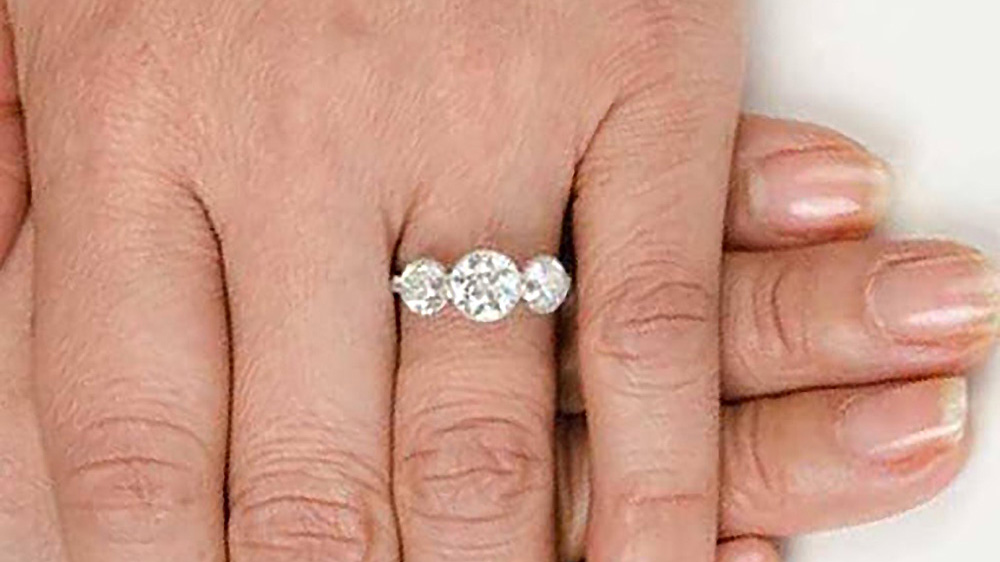 three stone bezel set diamond ring