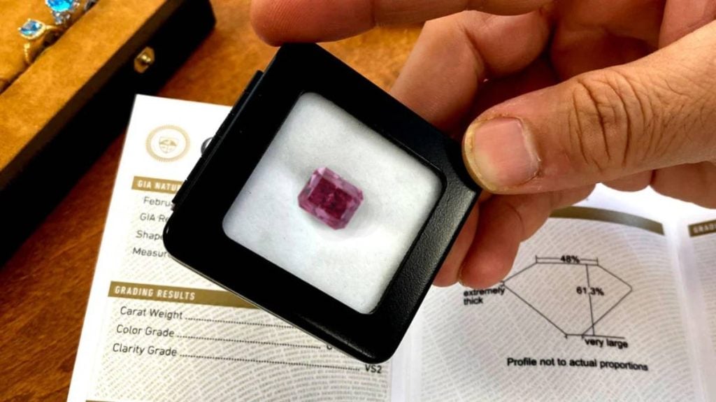 GIA with Purplish Red Emerald Cut Diamond in Box