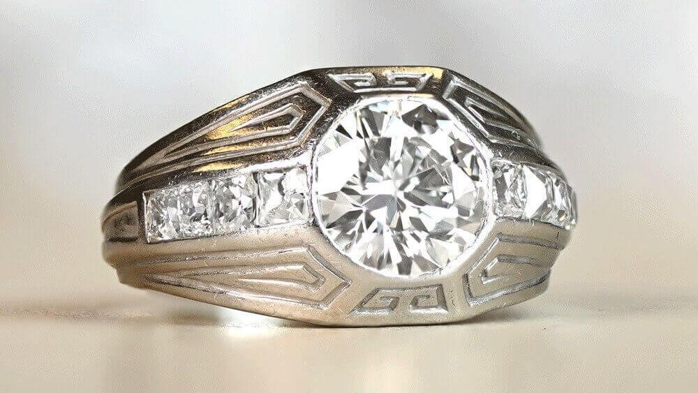 A wide geometric Art Deco diamond ring.