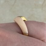 VCA ring showcasing round brilliant cut diamonds mounted in 18k yellow gold