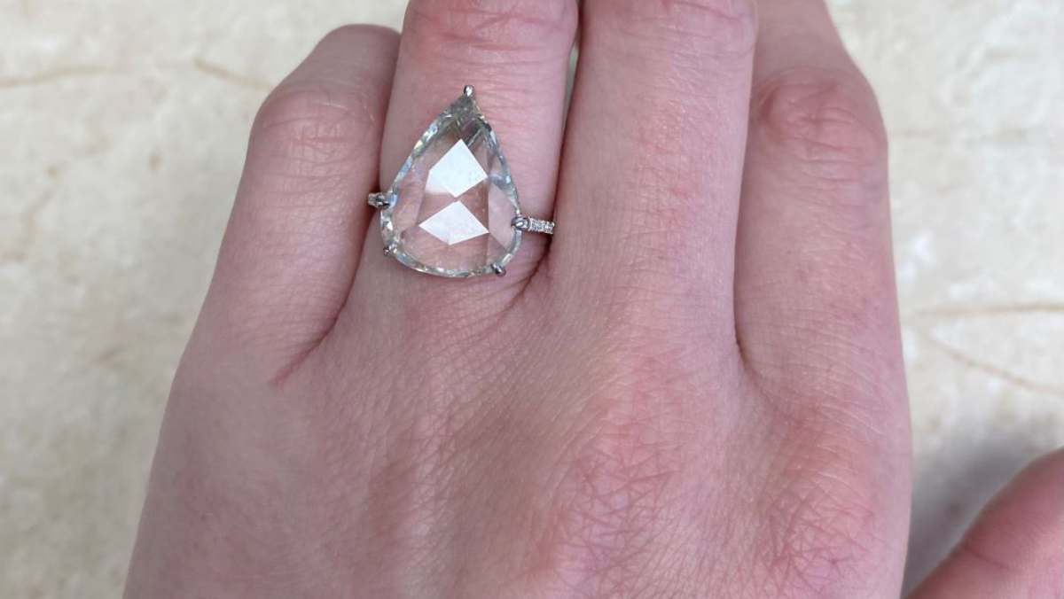 Rose cut 6.00 carat diamond center stone with diamonds along the shank