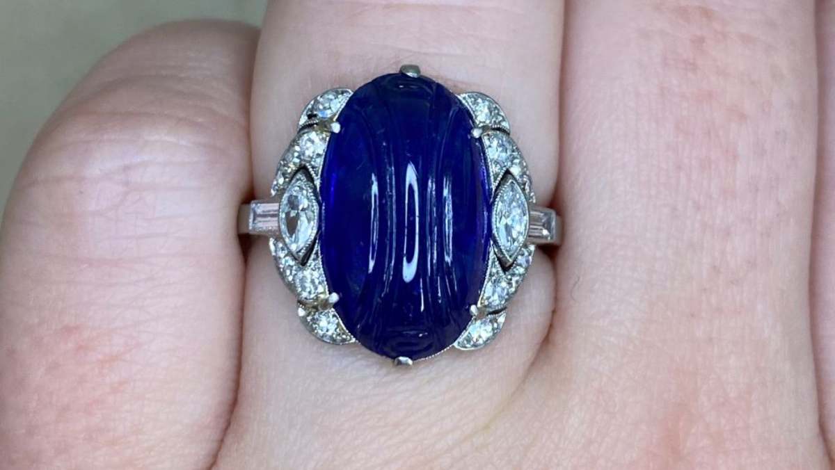 8.64 carat center sapphire stone with diamond accent detailing