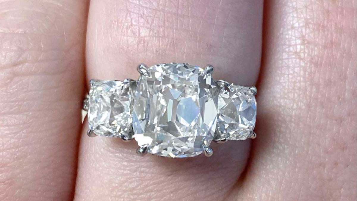 3.53 center cushion cut diamond with diamond accents