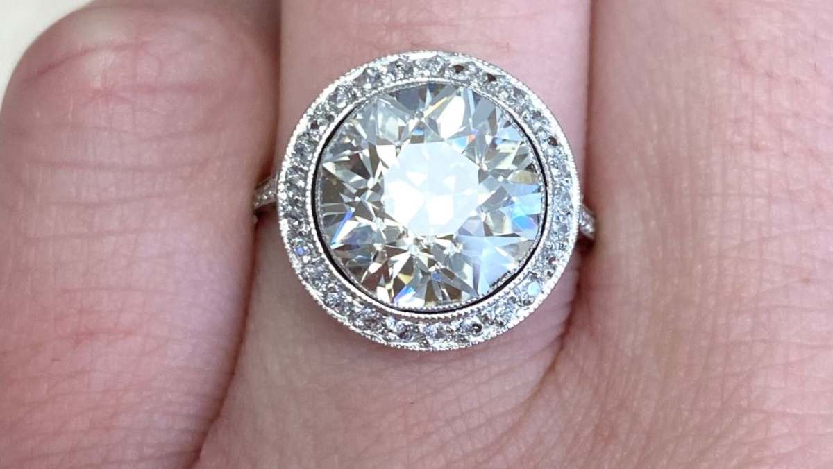 center 4.37 carat diamond with diamond halo ring