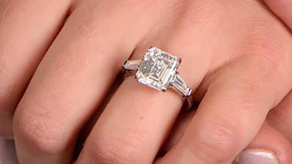 emerald cut diamond ring with baguette cut side diamonds