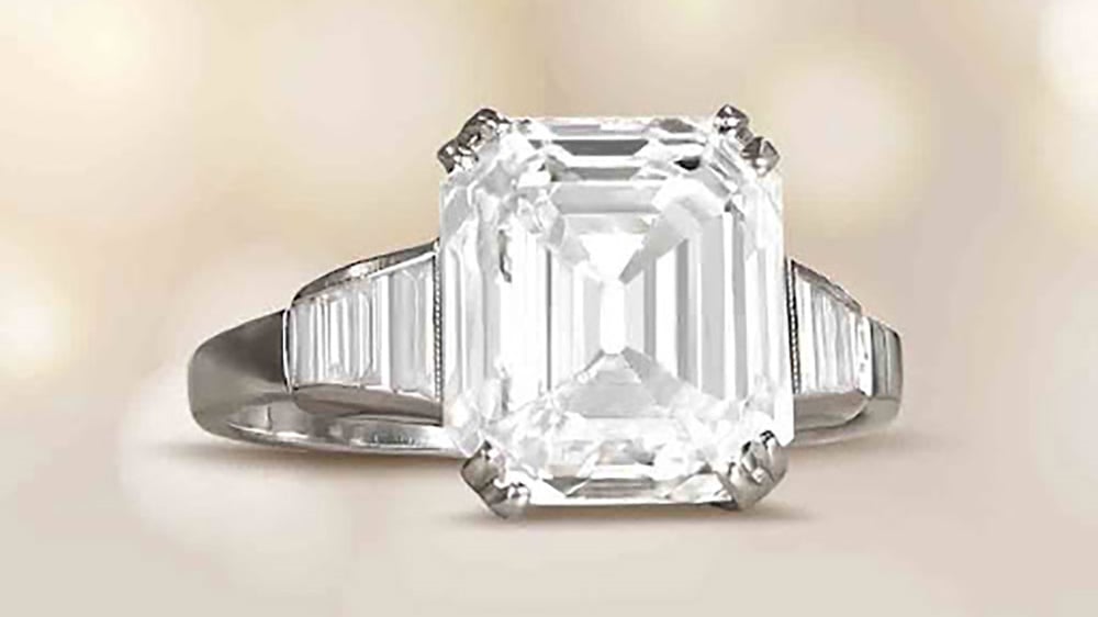 emerald cut diamond ring with baguette cut diamonds in platinum