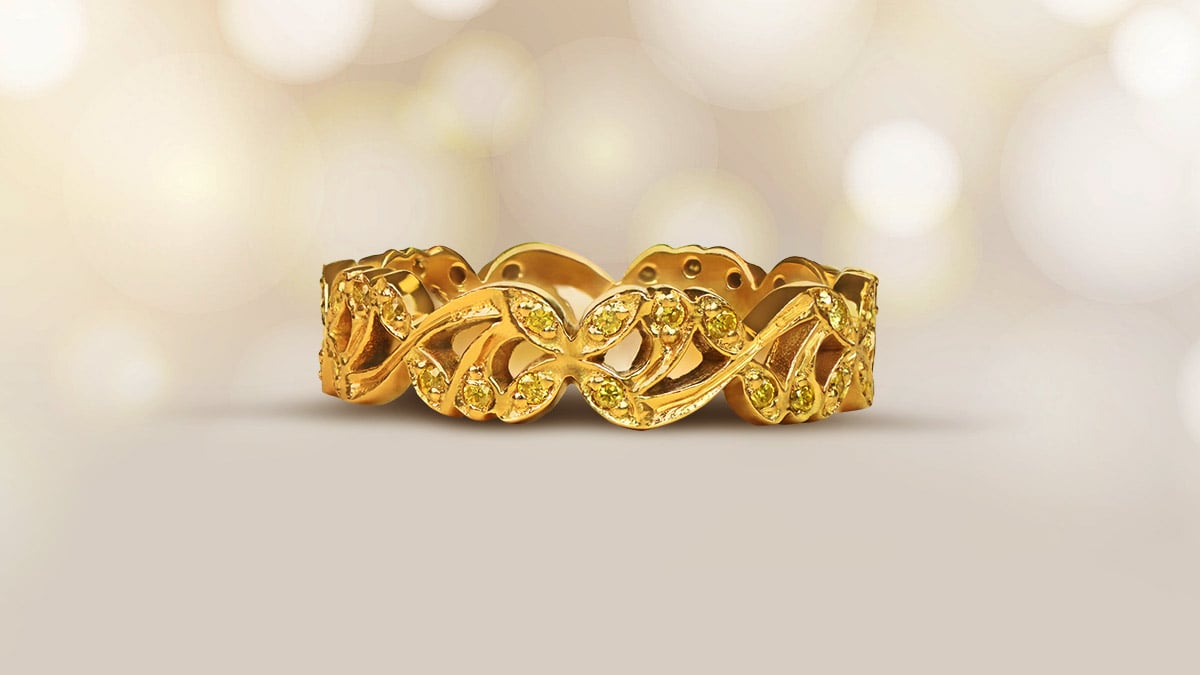 Yellow diamond shared prong wedding band