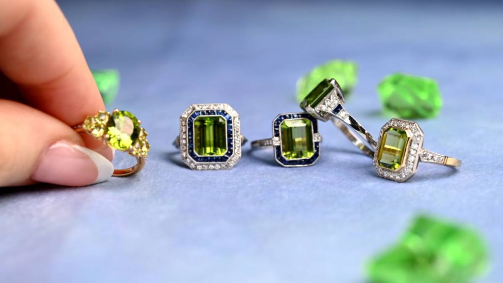 August Gemstone Peridot Rings with Model Finger