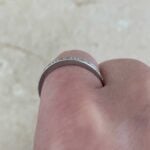 Tiffany platinum wedding band featuring an engraved design