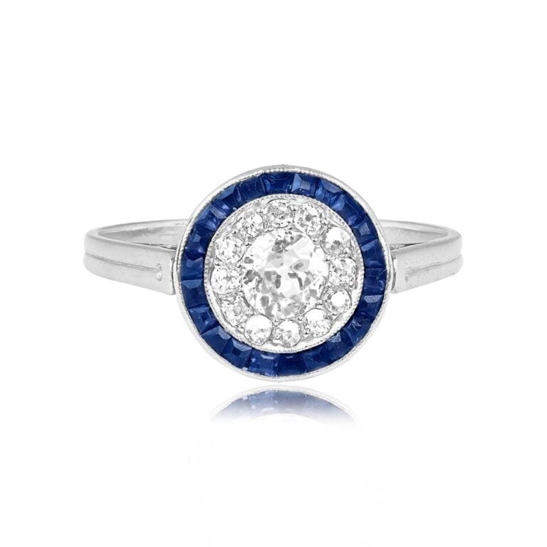 Antique Diamond and Sapphire Halo Platinum Virden Ring. Circa 1920