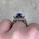 Midvale Ring highlighting a Sapphire oval cut center stone