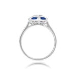 diamond center stone with diamond and sapphire halo and sapphires on the shoulders ring 14260