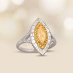 Fancy Light Yellow 0.74ct Marquise Diamond with diamond halo Bangor Ring 15516