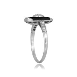Art Deco Onyx and bezel set center Diamond Lander Ring, Circa 1920 15562