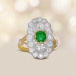 0.65ct Emerald with Elongated Diamond Cluster Halldale Ring JN25-06 artistic photo