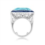 emerald cut 24 carat aquamarine center stone with sapphire and diamond halo ring 13332