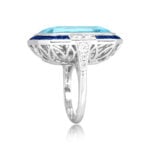 emerald-cut bezel set aquamarine center surrounded by sapphires ring 13332