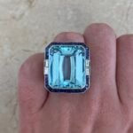 Oriole Ring featuring a 24.00 carat emerald cut aquamarine