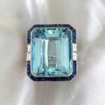 Oriole Ring with two baguette cut diamonds on both side