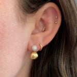 Corrigan Earrings featuring a top section of 18k white gold