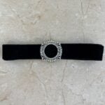 necklace with an open leaf motif decorating each corner