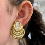earrings featuring pave-set diamond in a platinum setting