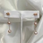 Curtis Earrings featuring three pearls with a pink rose luster