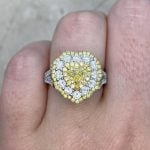 Front Finger View 0.90 carat heart-shaped yellow diamond with SI1 clarity f2 ROM31