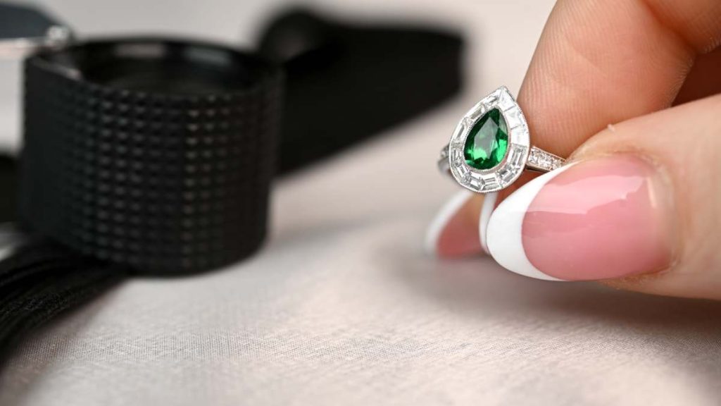 Zambian Emerald with Jewelers Loupe