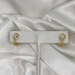 Tiffany & Co earrings featuring a polished ribbed X design