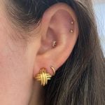 Tiffany & Co earrings with an an omega-back closure