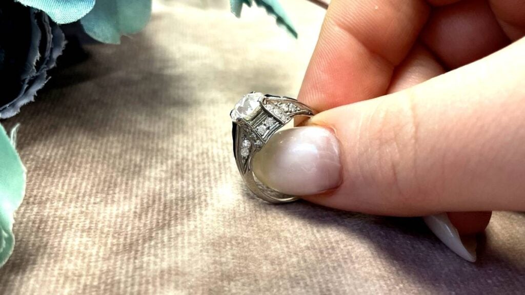 Model Holding Pave Diamond Style Setting Ring