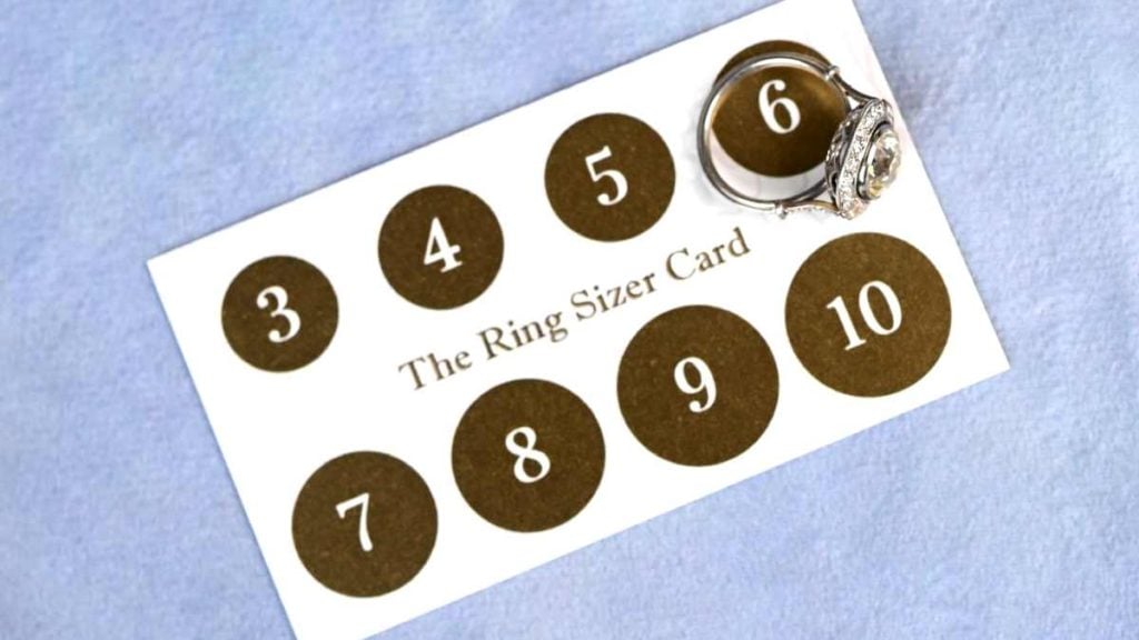 Engagement Ring Measured on Ring Sizer Card