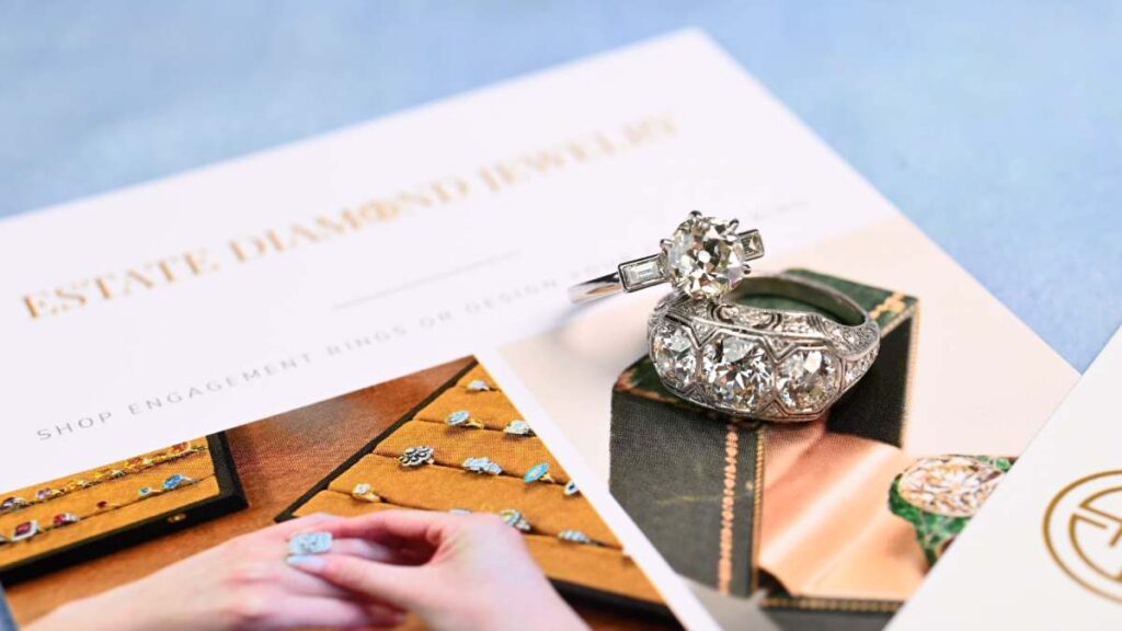 Two Vintage diamond rings on top of rack cards
