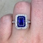 emerald-cut sapphire center with baguette-cut diamond halo f2 15892
