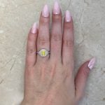 platinum ring featuring center round brilliant yellow diamonds Hand Picture f115896