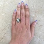 Vintage Diamond and Emerald Engagement Ring Hand Picture f1 15936