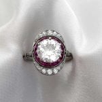 Elongated Diamond and Ruby Engagement Ring White Backdrop f5 15940